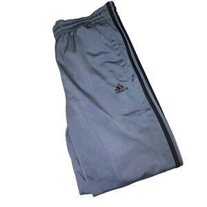 Adidas track pants in grey with signature black 3-Stripes down large